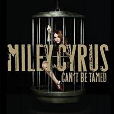 Miley in a cage